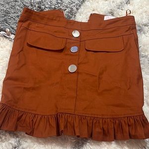 Pink lily burnt orange skirt